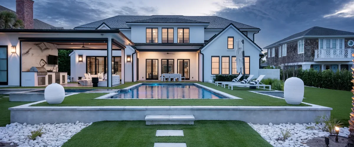evening-view-of-modern-backyard-pool-with-lounge-chairs-ponte-vedra
