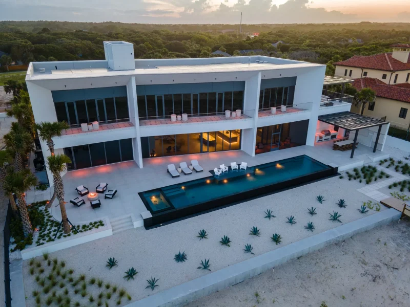 luxury-modern-home-infinity-pool-evening-jacksonville-clarkson-pools